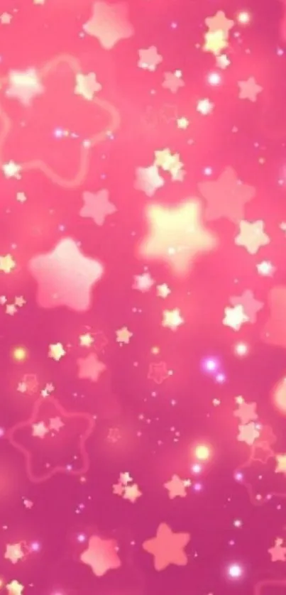 Pink starry night wallpaper with glowing stars.