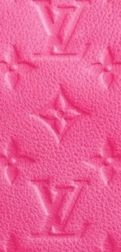 Vibrant pink textured wallpaper with embossed designer pattern.