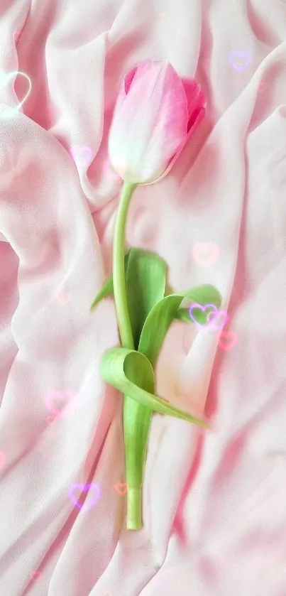 Pink tulip on soft pink fabric with pastel hearts.