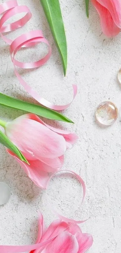 Light pink tulips and leaves on textured background with decorative elements.