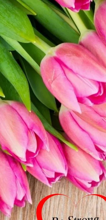 Pink tulips with a 'Be Strong' message and a heart outline.