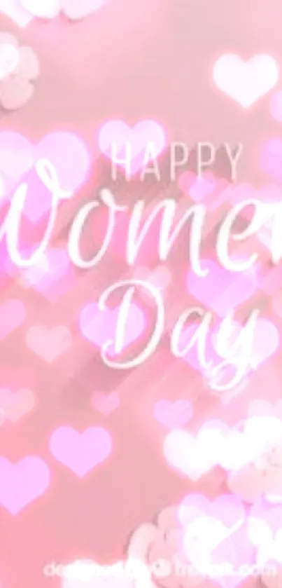 Pink Women's Day wallpaper with flowers and text.