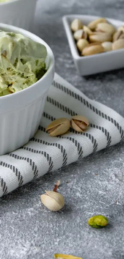 Pistachio ice cream with scattered nuts on a towel.
