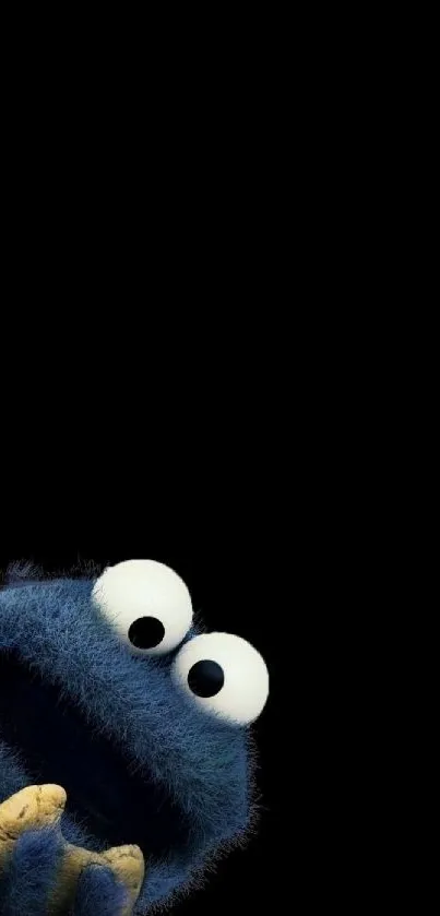 Cute blue monster peeking on black wallpaper.