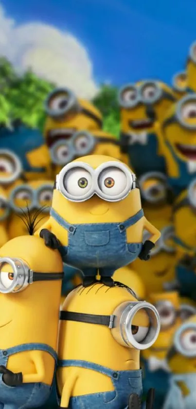 Cheerful cartoon minions gather in colorful group pose for mobile wallpaper.