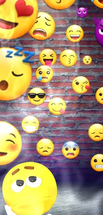 Colorful emoji faces on a brick wall wallpaper.