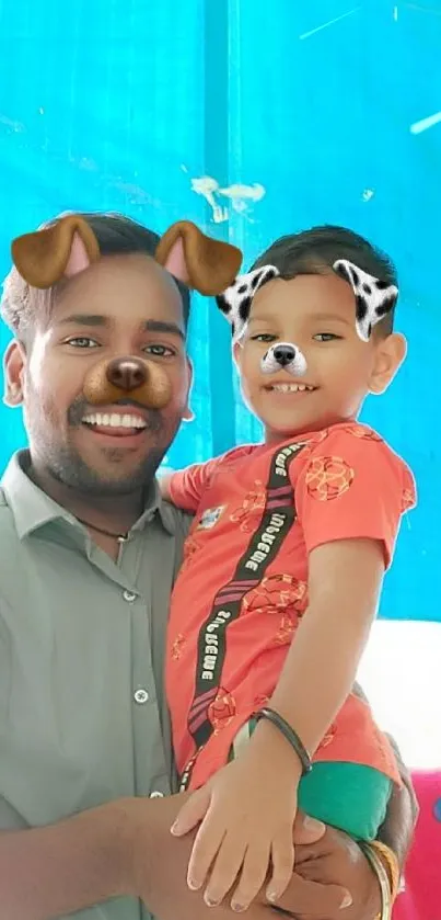 Father and child with dog filters smiling in teal background.