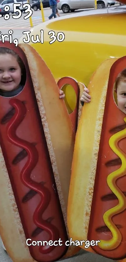 Children wearing hotdog suits for a fun photo.