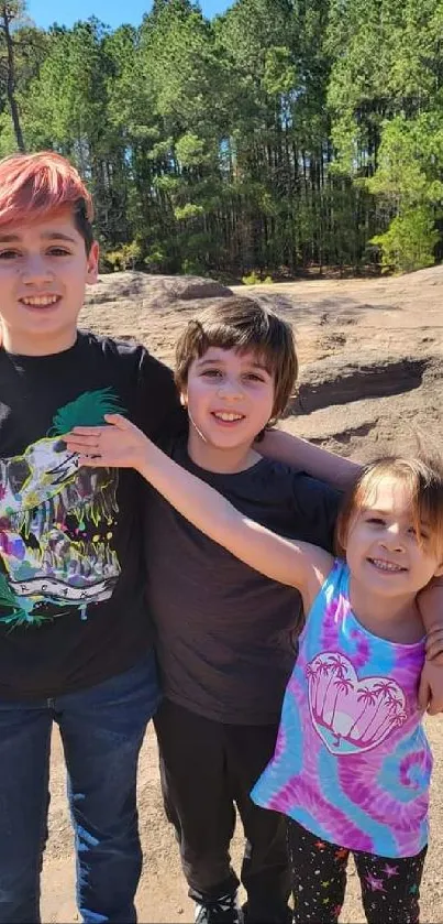 Three joyful kids enjoying a sunny day outdoors.