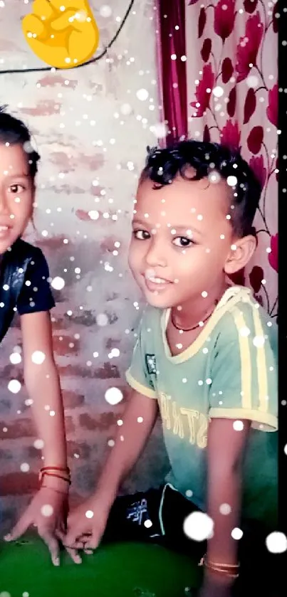 Two smiling kids with snow overlay effect indoors.