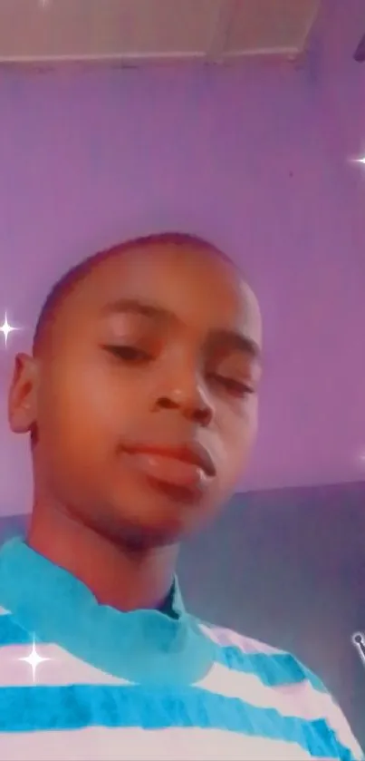 Playful starry selfie with sparkles and crown effects on a young person.