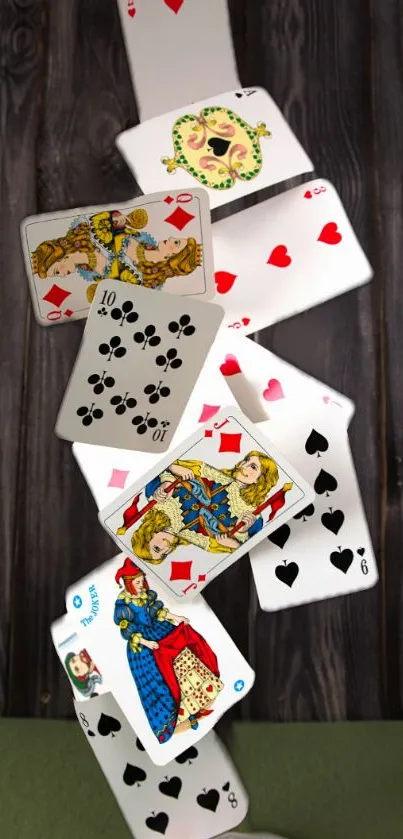 Cascading playing cards with wooden background.