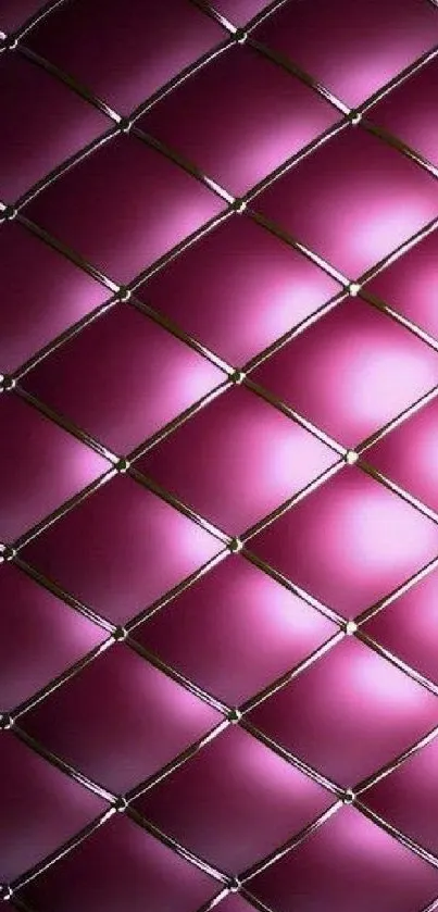 Plush pink geometric wallpaper with a quilted diamond pattern.