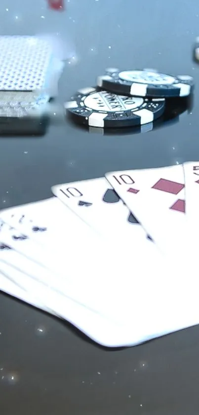 Poker night wallpaper with cards and chips on a black table.