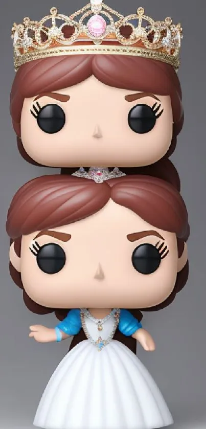 Stacked princess vinyl figures with crowns.