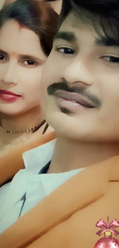 Couple portrait with peach tones on mobile wallpaper.