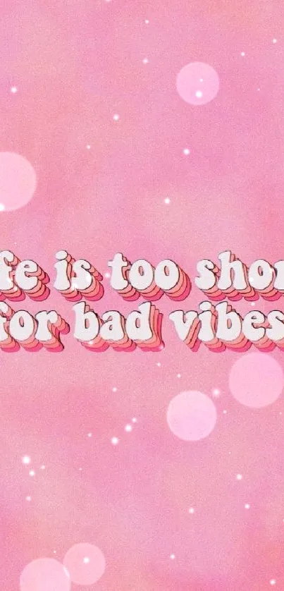 Pink wallpaper with 'Life is too short for bad vibes' text.