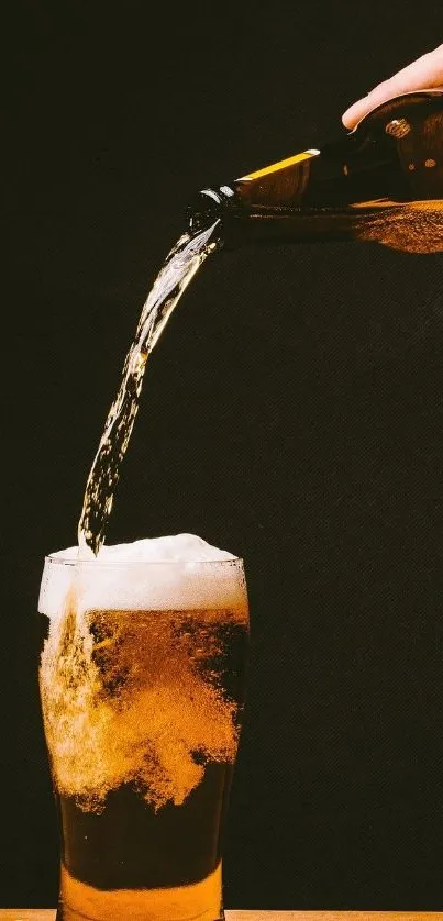 Beer being poured into a glass on a dark background.