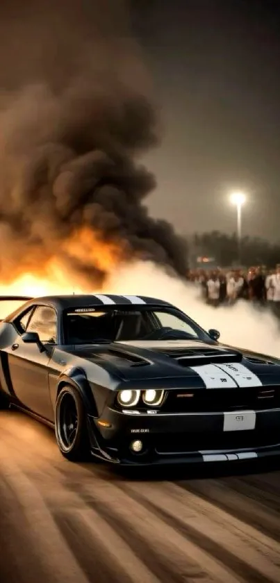 Black muscle car in motion with smoke backdrop at night.