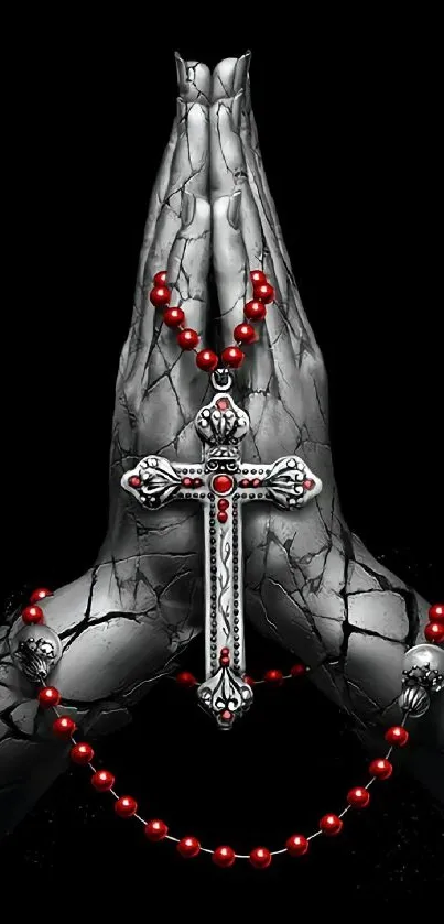 Gothic wallpaper with praying hands holding a cross and red rosary beads.