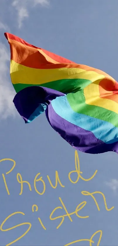 Pride flag waving in blue sky with 'Proud Sister' text.