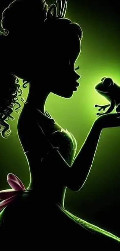 Silhouette of princess holding frog with glowing green backdrop.