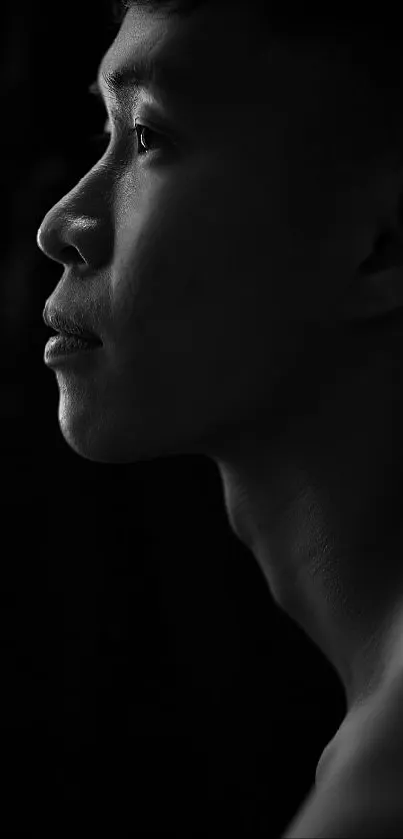 Black and white silhouette portrait of a person's profile.