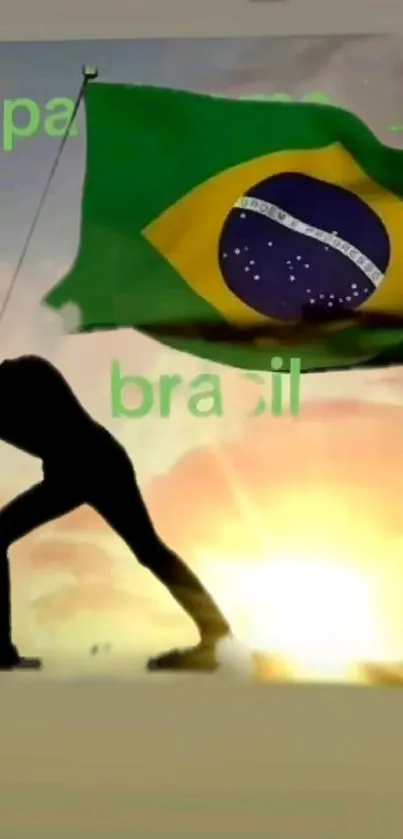 Silhouette raising Brazilian flag at sunset.