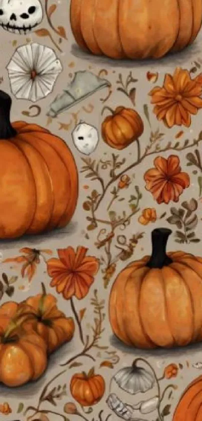 Orange pumpkins and autumn flowers on a decorative background.