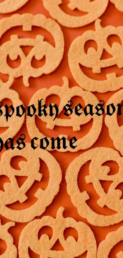 Pumpkin Halloween wallpaper with spooky text.