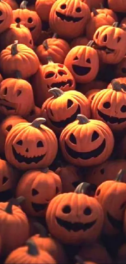 A cluster of carved pumpkins with spooky expressions.