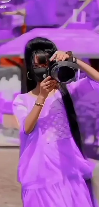 Person in purple dress holding a camera against a colorful backdrop.