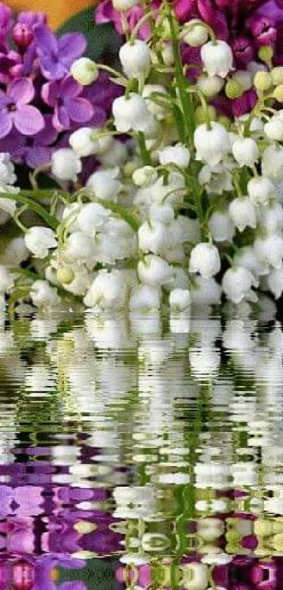 Purple and white flowers reflecting on water.