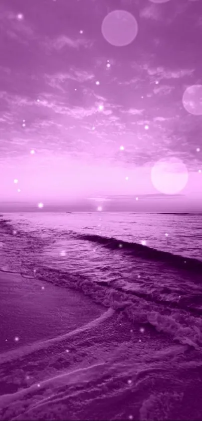 Purple sunset over beach with waves crashing.