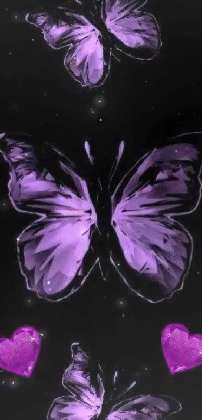 Purple butterflies and hearts on black background wallpaper.