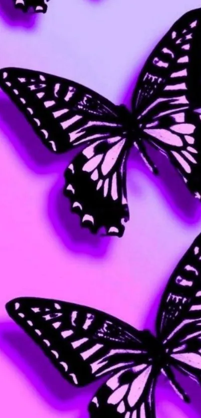 Purple and black butterfly design on wallpaper.