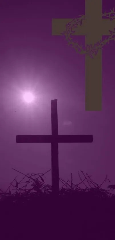 Purple cross silhouette against sunset sky.