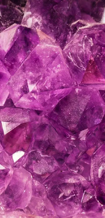 Vibrant purple crystal gemstone wallpaper showcasing textured amethyst hues.