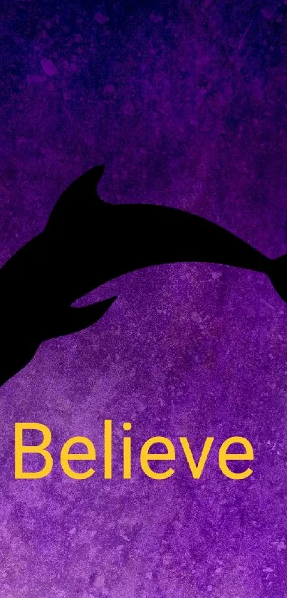 Purple dolphin silhouette with 'Believe' text.