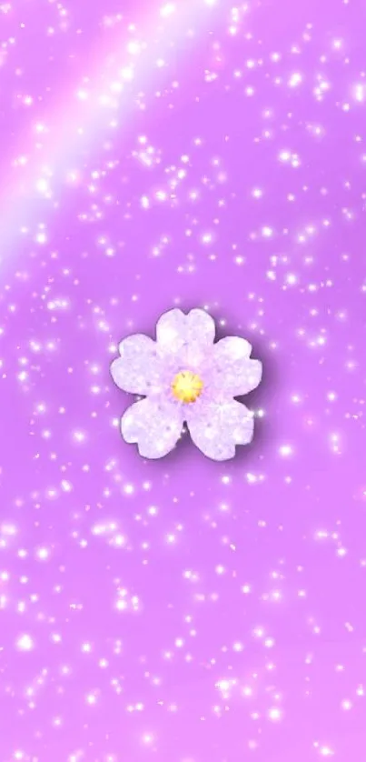 Purple glittery flower on a sparkling background.