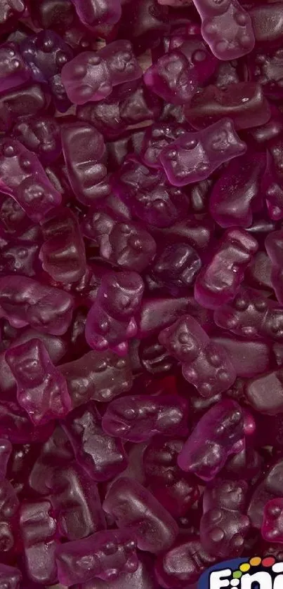 Purple gummy bear wallpaper with vibrant candy pattern.