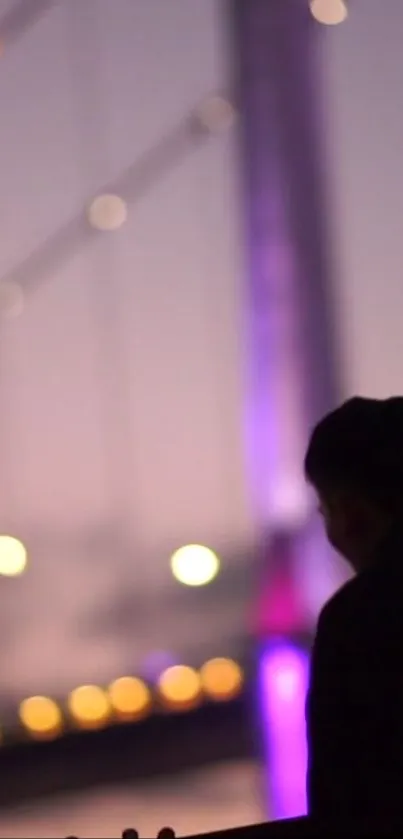 Silhouette against a purple cityscape with glowing bokeh lights.