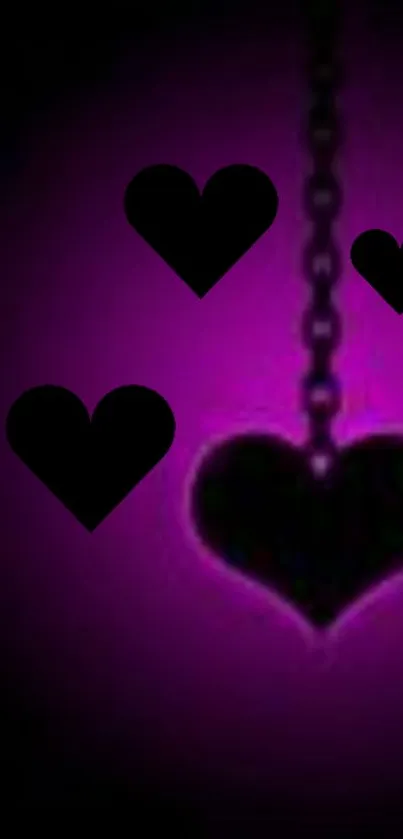 Heart silhouettes on a purple chain background wallpaper.