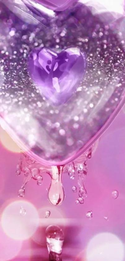 Purple heart crystal with shimmering water droplets on pink background.