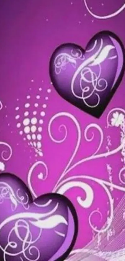 Vibrant purple heart wallpaper with floral swirls.