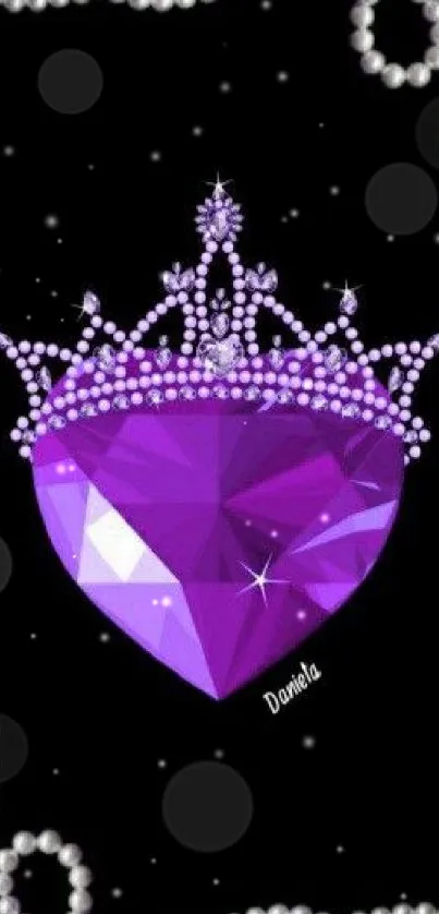 Purple heart gem with crown and pearls on black background.