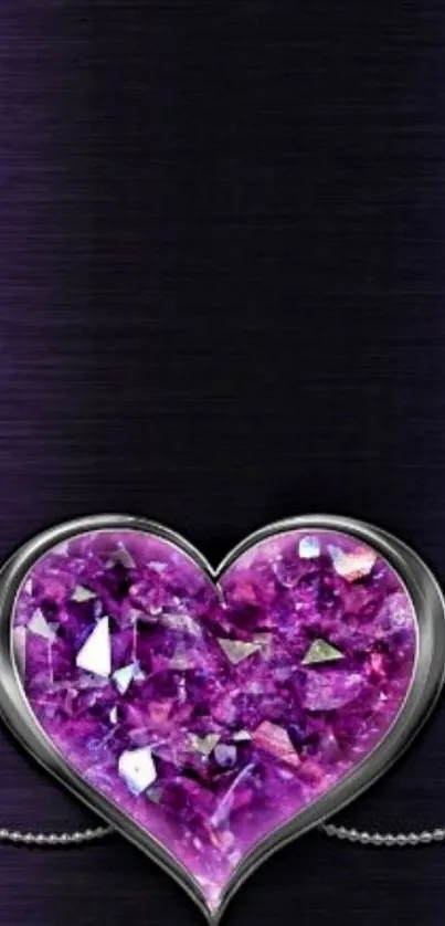 Purple gemstone heart on dark background.