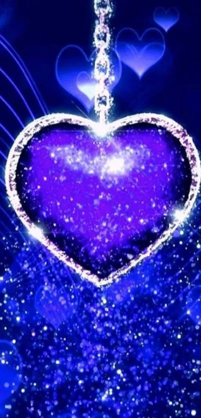 Glowing purple heart on blue background with sparkles display.