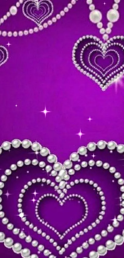 Elegant purple wallpaper with jeweled hearts covering the screen.