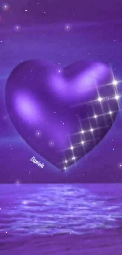 Purple heart with starry reflections over a serene ocean.